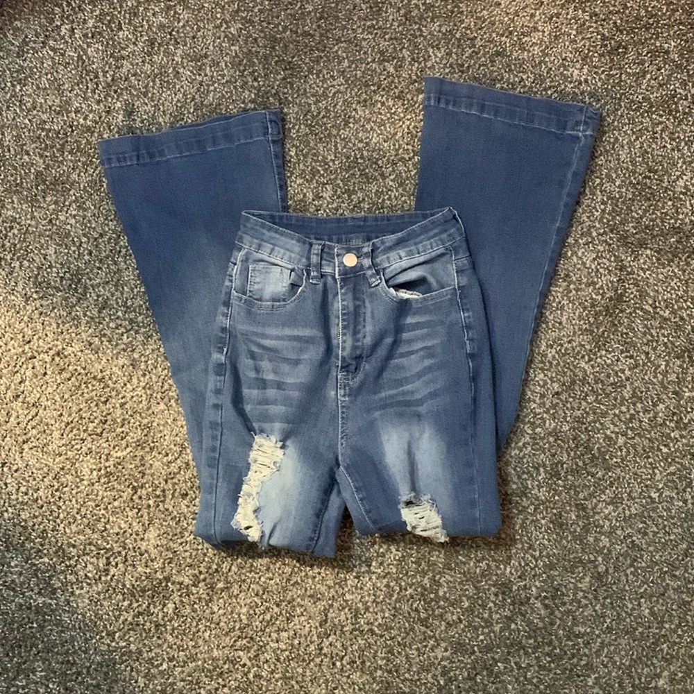 ripped flared jeans